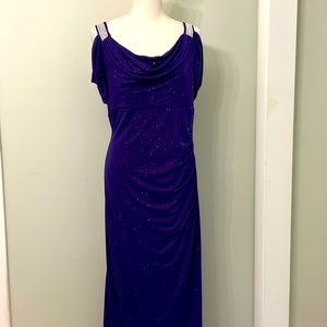 Stunning never worn Grecian sparkling purple gown features rhinestone shoulders!